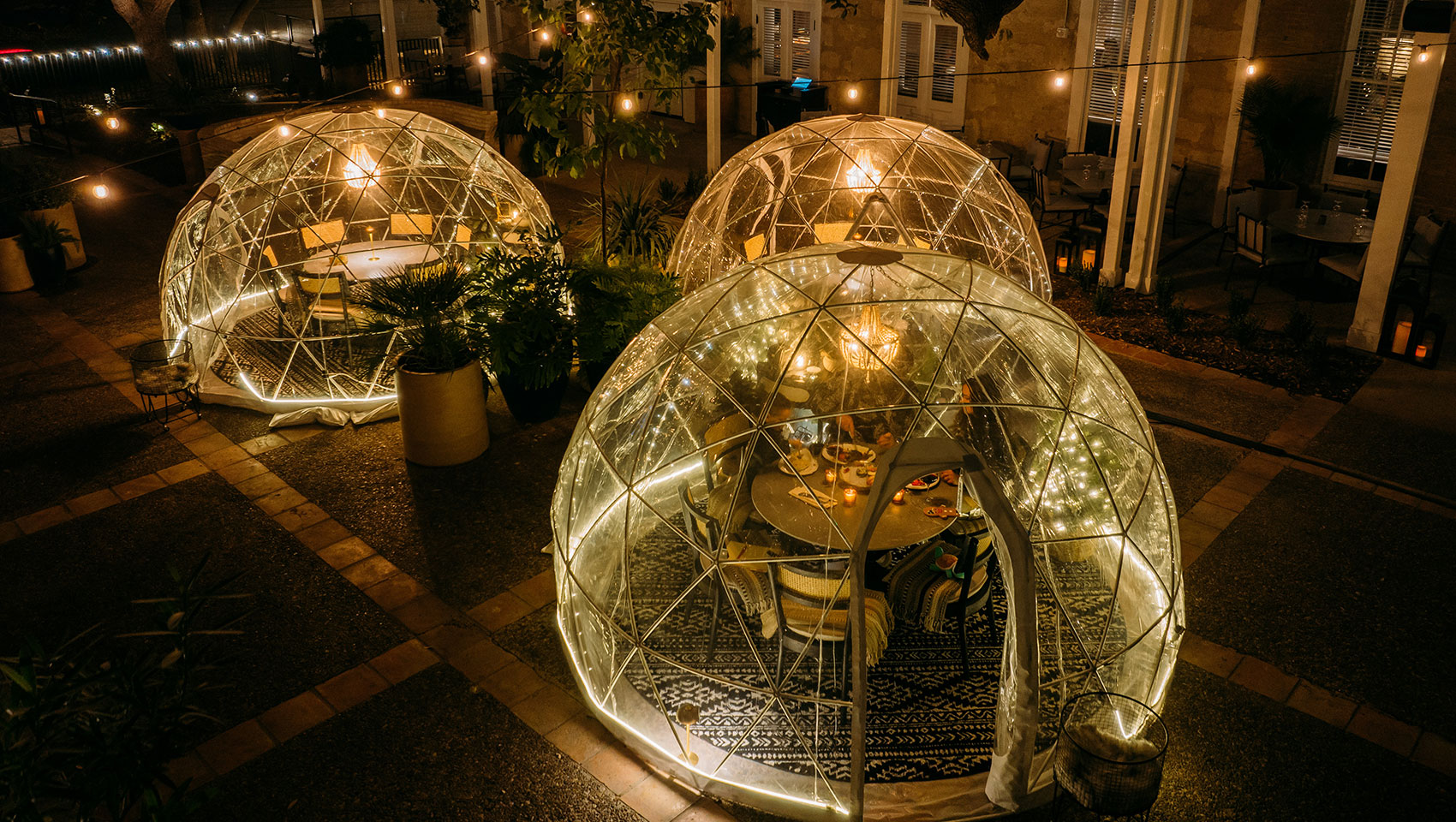 Clear domes for outdoor dining winter at Kimpton Santo
